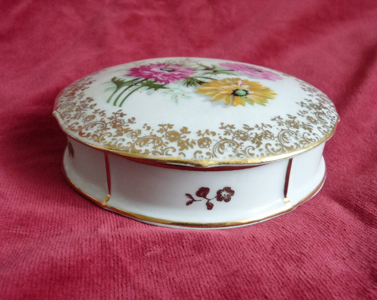 Boîte de commode de Limoges, par Henri Remouleau, motif floral peint à la main et liseré doré, vers 1920