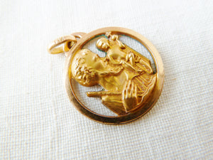 Antique Saint Christopher Medal, 22 carat Rolled Gold, French by FIX, Circa 1910, 2 centimetres diameter, 2 grams