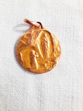 Load image into Gallery viewer, Antique Loudes Medal Signed Tairac, 22 carat Rolled Gold, French Fixe, Circa 1910, 2 centimetre diameter, 2 grams