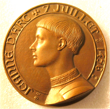 Load image into Gallery viewer, SOLD Bronze Medal of Saint Joan of Arc by Josette Hébert-Coëffin 1931 Depicting Young Joan in Armour and Cross Rising From Fire On The Reverse