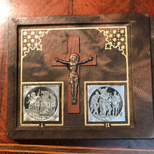 Load image into Gallery viewer, Portable Stations Of The Cross Shrine, Book Form, 14 Pewter Medallions Set On Leather, Gold Blocked, Beautiful Condition. Silver Corpus Christi with Gilded Halo