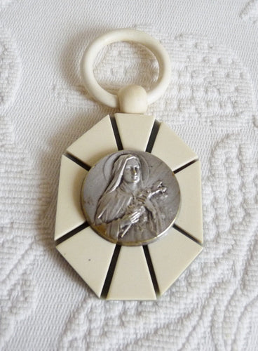 Antique Bakelite Cot Pendant, Saint Therese Of The Roses, Signed Karo, Atelier St Joseph  Circa 1930